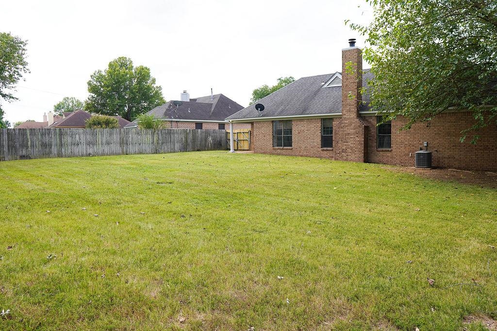 5488 Ross Road Memphis, TN 38141 - Photo 17 of 18 a house view with garden space