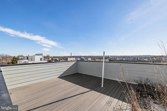 a view of a hallway with a workspace
