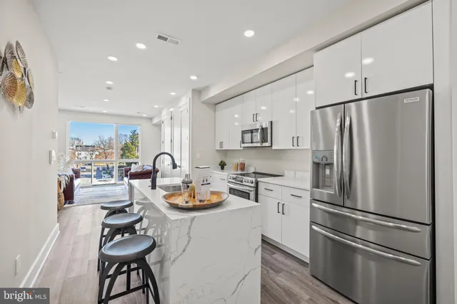 a front view of a building with street view