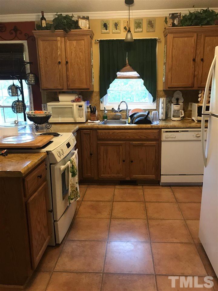 907 Delham Road Knightdale, NC 27545 - Photo 5 of 11 JenAir stove with grill, refrigerator stay. Great space.