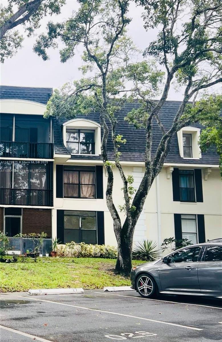a car parked in front of a house