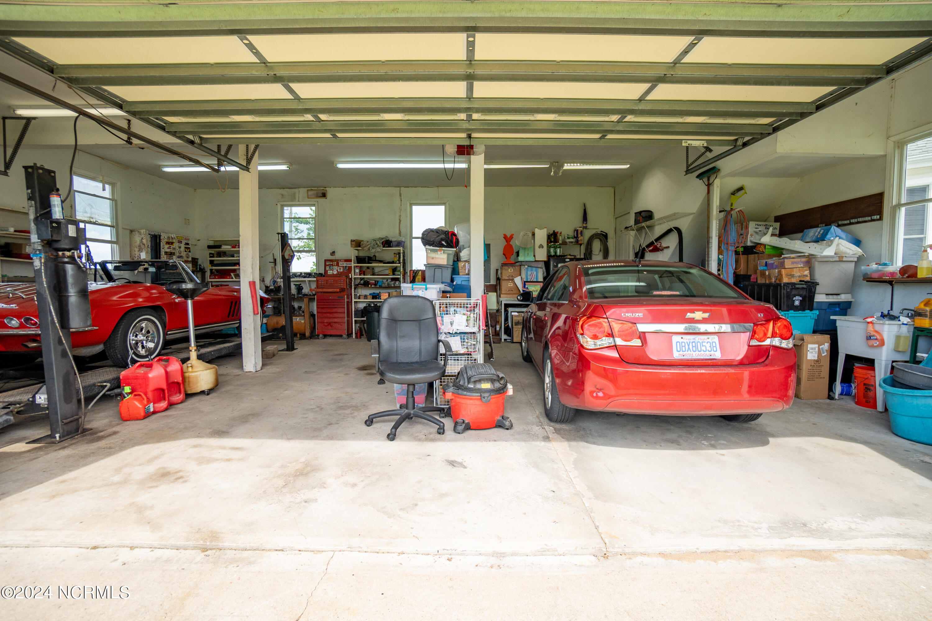 170 Narrow Shore Road Aydlett, NC 27916 - Photo 35 of 48 3 car garage with lift