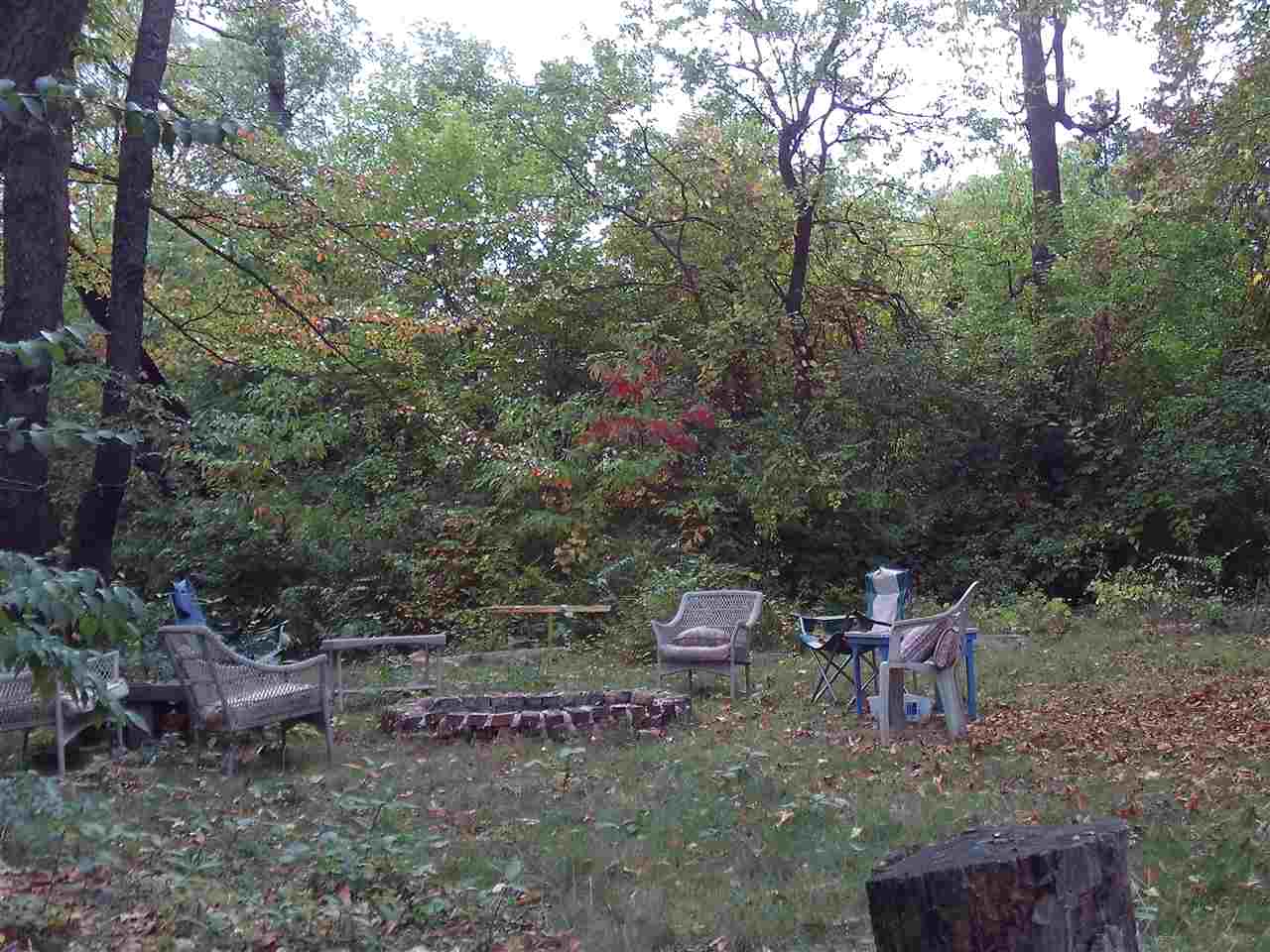 21469 Greenview Road Southfield, MI 48075 - Photo 4 of 19 Backyard features a large in-ground bonfire already established and ready for entertaining!