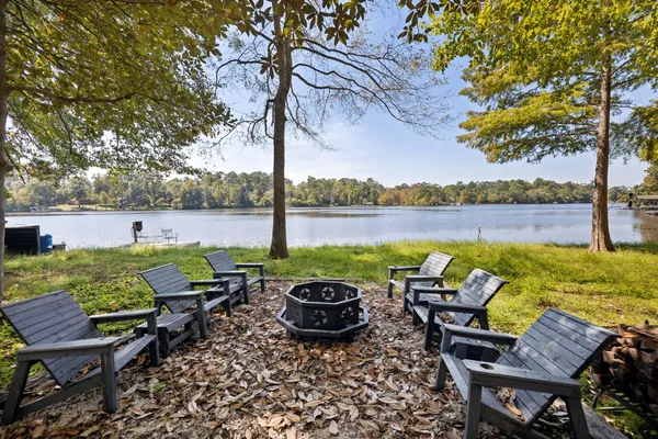 a view of a patio with a table chairs and a patio