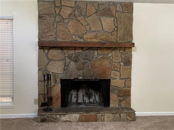 a fireplace with a clock on it