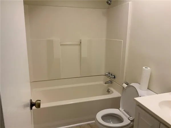 a bathroom with a sink and a bathtub
