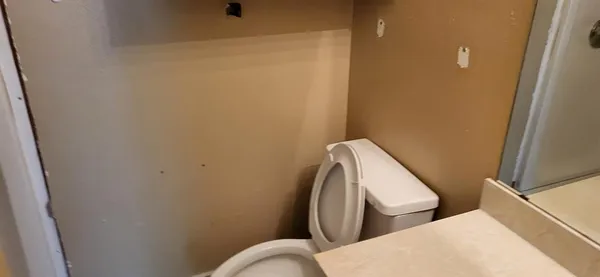 a view of bathroom with toilet