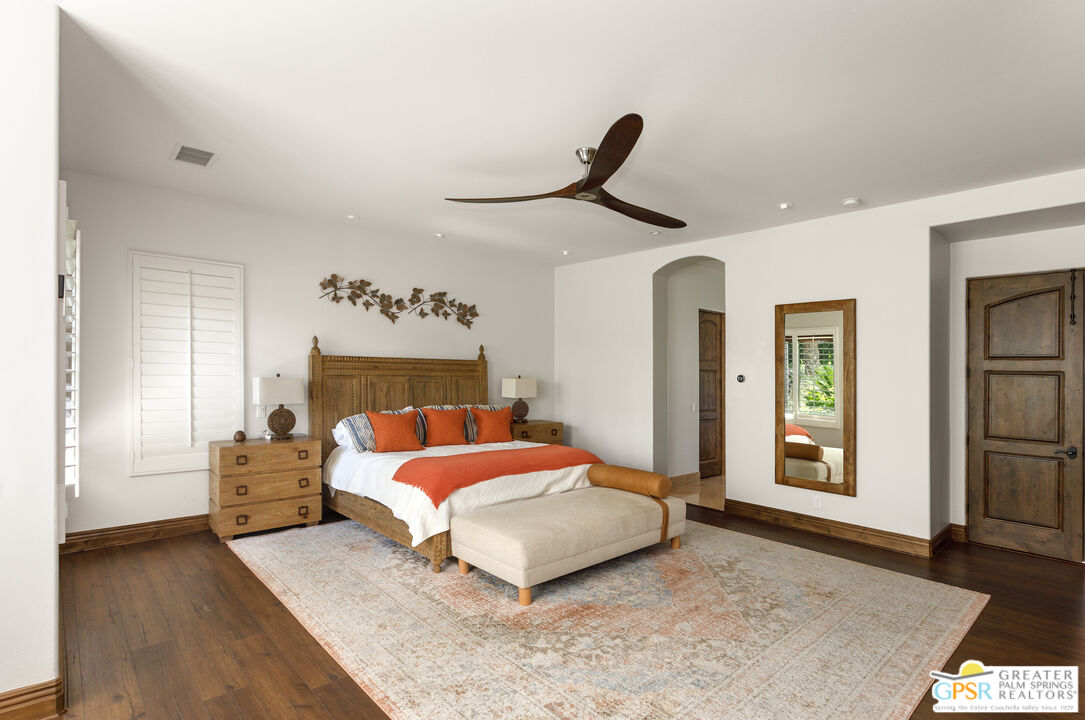 49880 Rancho San Felipe La Quinta, CA 92253 - Photo 15 of 47 a bedroom with a large bed and a window