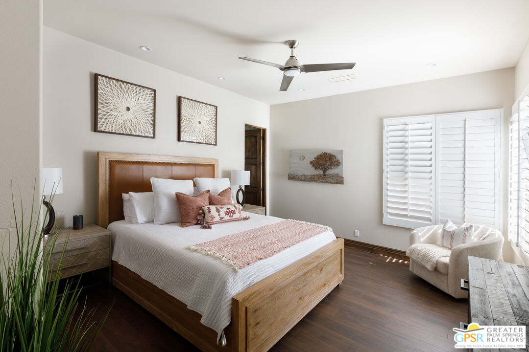 49880 Rancho San Felipe La Quinta, CA 92253 - Photo 22 of 47 a bedroom with a bed and a couch