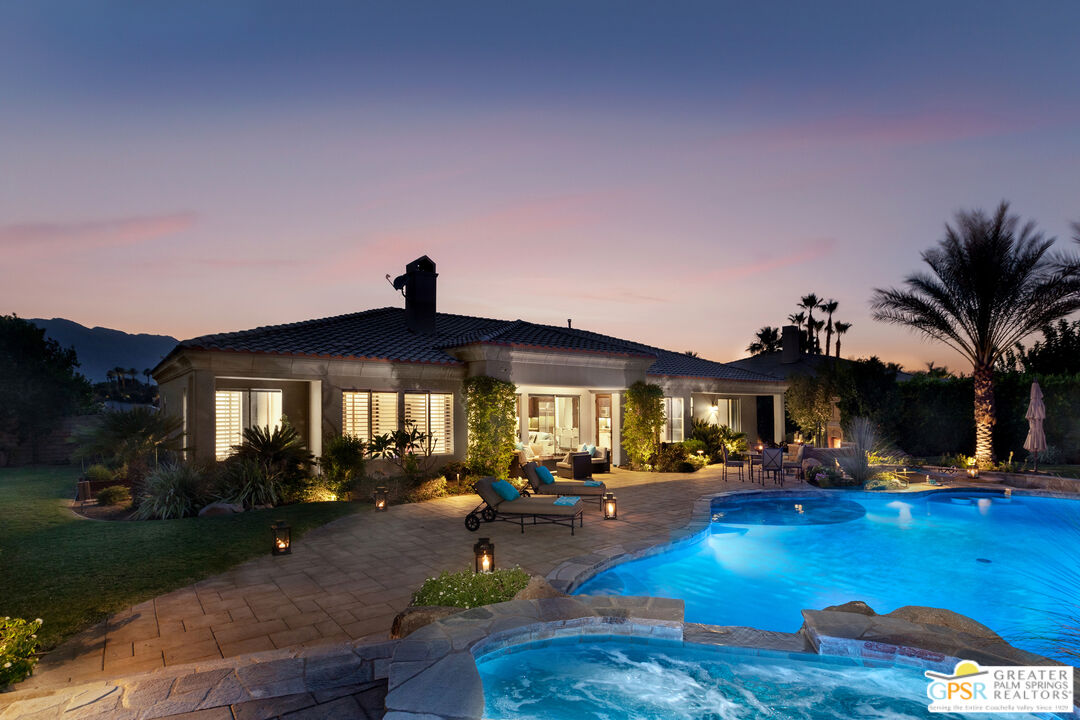 49880 Rancho San Felipe La Quinta, CA 92253 - Photo 27 of 47 a group of people sitting in front of a house