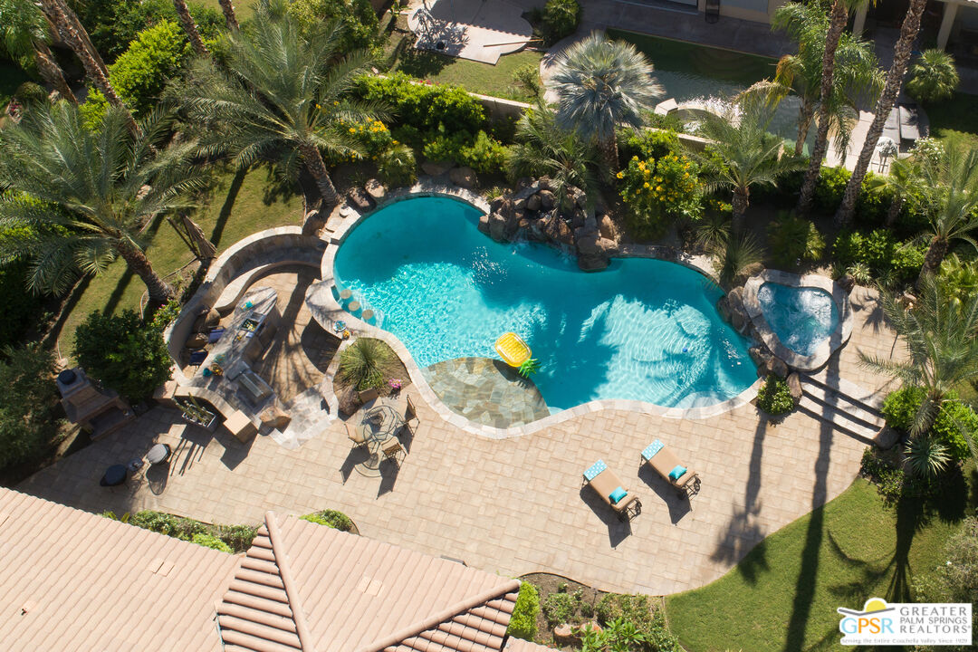 49880 Rancho San Felipe La Quinta, CA 92253 - Photo 29 of 47 a backyard of a house with lots of green space