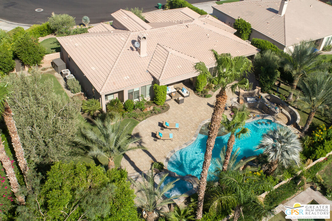 49880 Rancho San Felipe La Quinta, CA 92253 - Photo 39 of 47 an aerial view of a house with a yard and a large tree