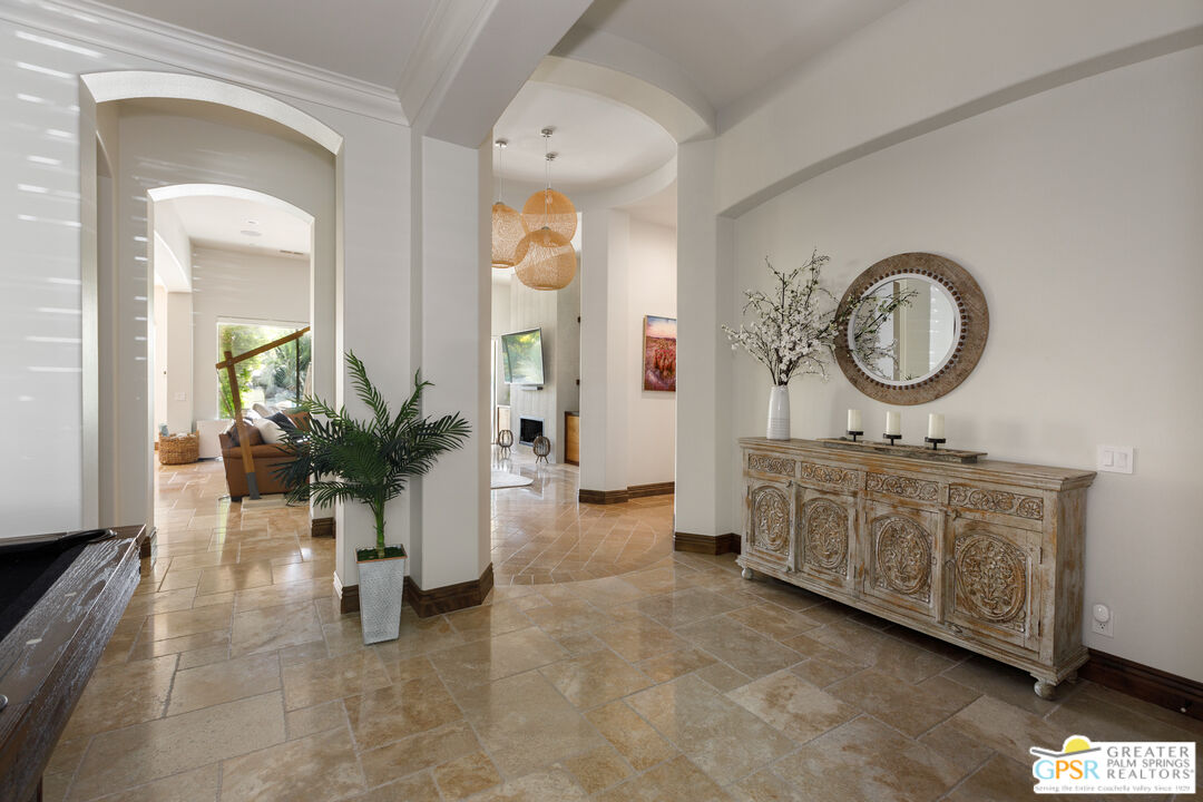 49880 Rancho San Felipe La Quinta, CA 92253 - Photo 5 of 47 a very nice looking room with a large window and a fireplace