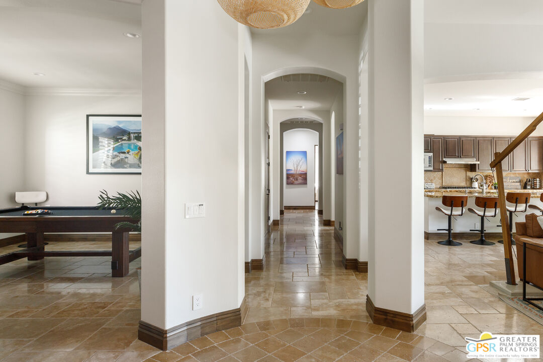 49880 Rancho San Felipe La Quinta, CA 92253 - Photo 6 of 47 a view of a livingroom with furniture and a hallway