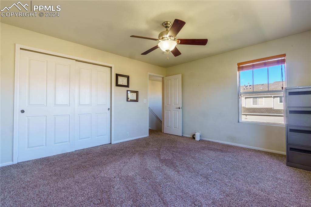 7332 Sandy Springs Point Fountain, CO 80817 - Photo 19 of 28 a view of an empty room with a window