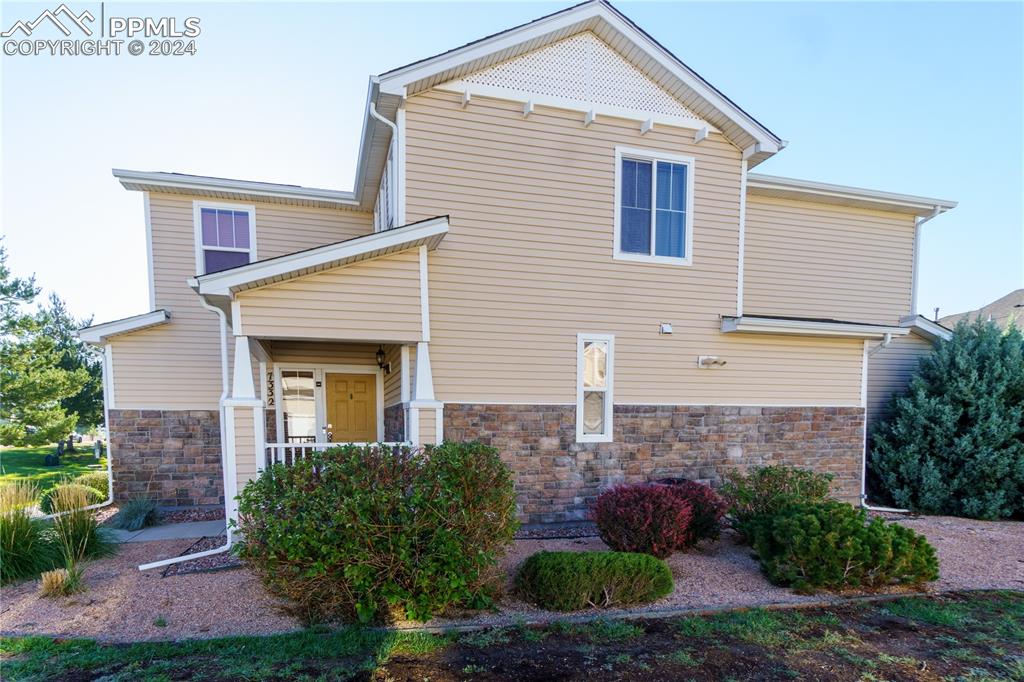 7332 Sandy Springs Point Fountain, CO 80817 - Photo 2 of 28 a front view of a house with garden