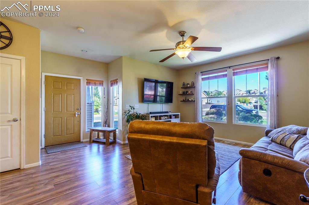 7332 Sandy Springs Point Fountain, CO 80817 - Photo 6 of 28 a living room with furniture and a window