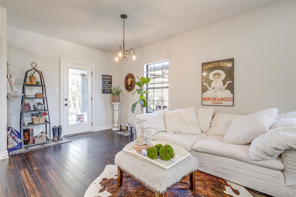 4920 Shining Star Trail Rio Vista, TX 76093 - Photo 15 of 40 a living room with furniture and wooden floor