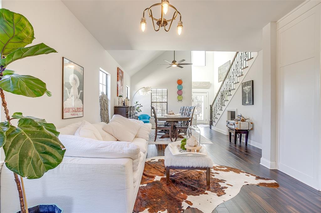 4920 Shining Star Trail Rio Vista, TX 76093 - Photo 17 of 40 a living room with patio bathtub and a chandelier