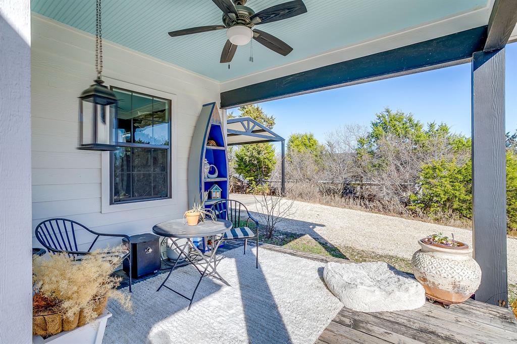4920 Shining Star Trail Rio Vista, TX 76093 - Photo 2 of 40 a living room with furniture and a large window