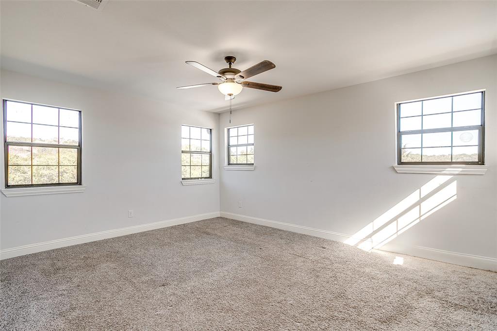 4920 Shining Star Trail Rio Vista, TX 76093 - Photo 21 of 40 a view of an empty room with a window