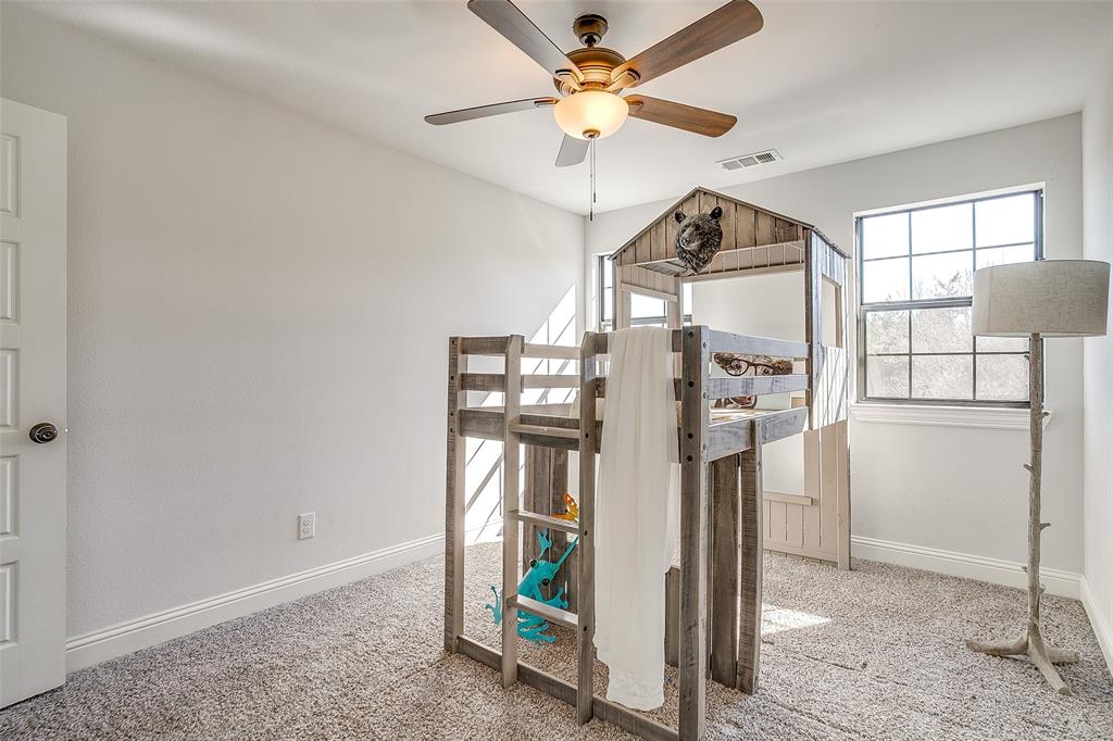 4920 Shining Star Trail Rio Vista, TX 76093 - Photo 27 of 40 a view of a hallway with windows and entryway