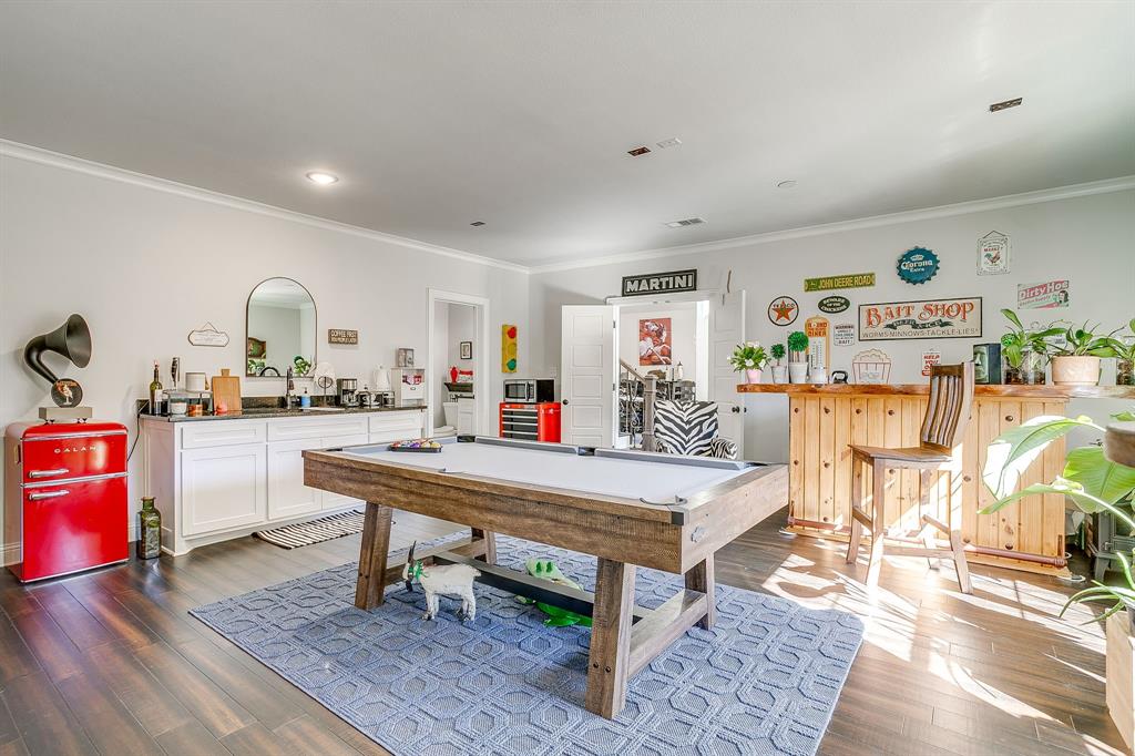 4920 Shining Star Trail Rio Vista, TX 76093 - Photo 8 of 40 a outdoor dining space with furniture and wooden floor