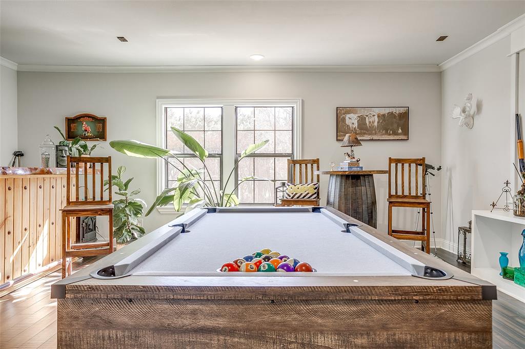4920 Shining Star Trail Rio Vista, TX 76093 - Photo 10 of 40 a living room with furniture flat screen tv and a large window
