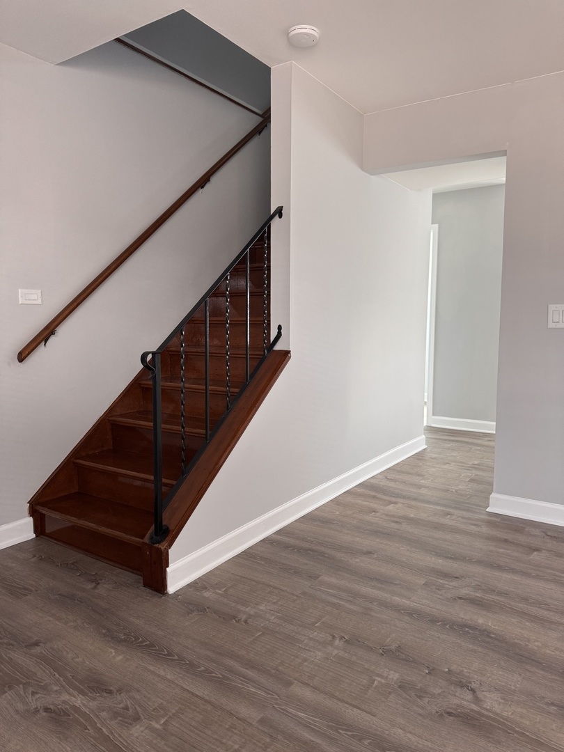 336 Lilac Lane, Unit H Elgin, IL 60123 - Photo 16 of 16 a view of entryway with wooden floor