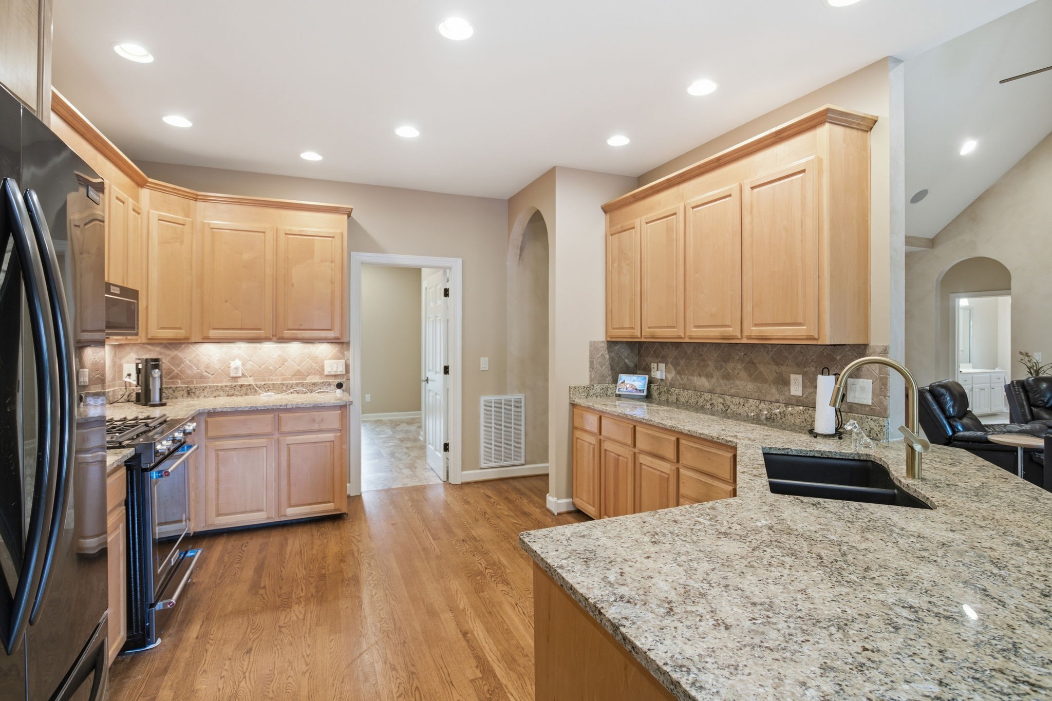 213 Bradshaw Road Lebanon, TN 37087 - Photo 17 of 65 a kitchen with a sink stove and refrigerator