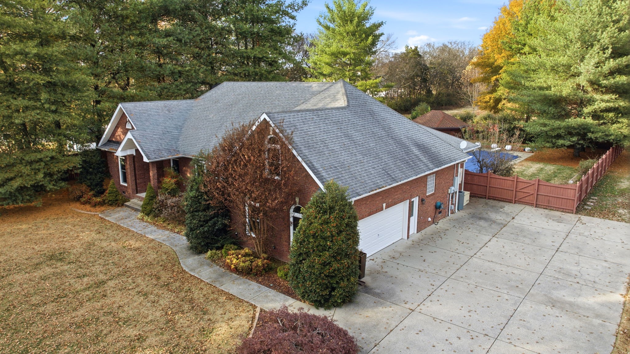 213 Bradshaw Road Lebanon, TN 37087 - Photo 4 of 65 a aerial view of a house with a yard and large tree