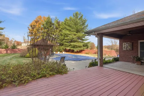 an aerial view of residential house with parking space