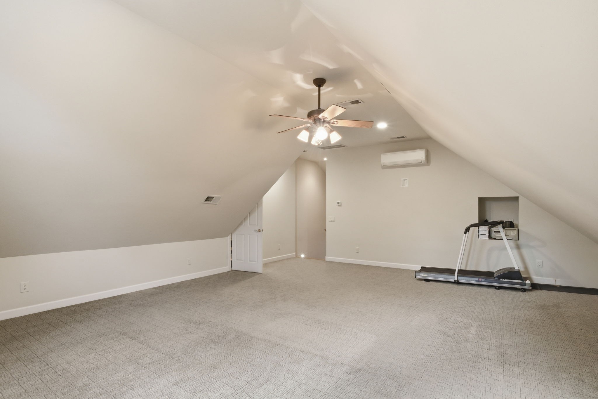 213 Bradshaw Road Lebanon, TN 37087 - Photo 47 of 65 an empty room with a chandelier fan and wooden floor