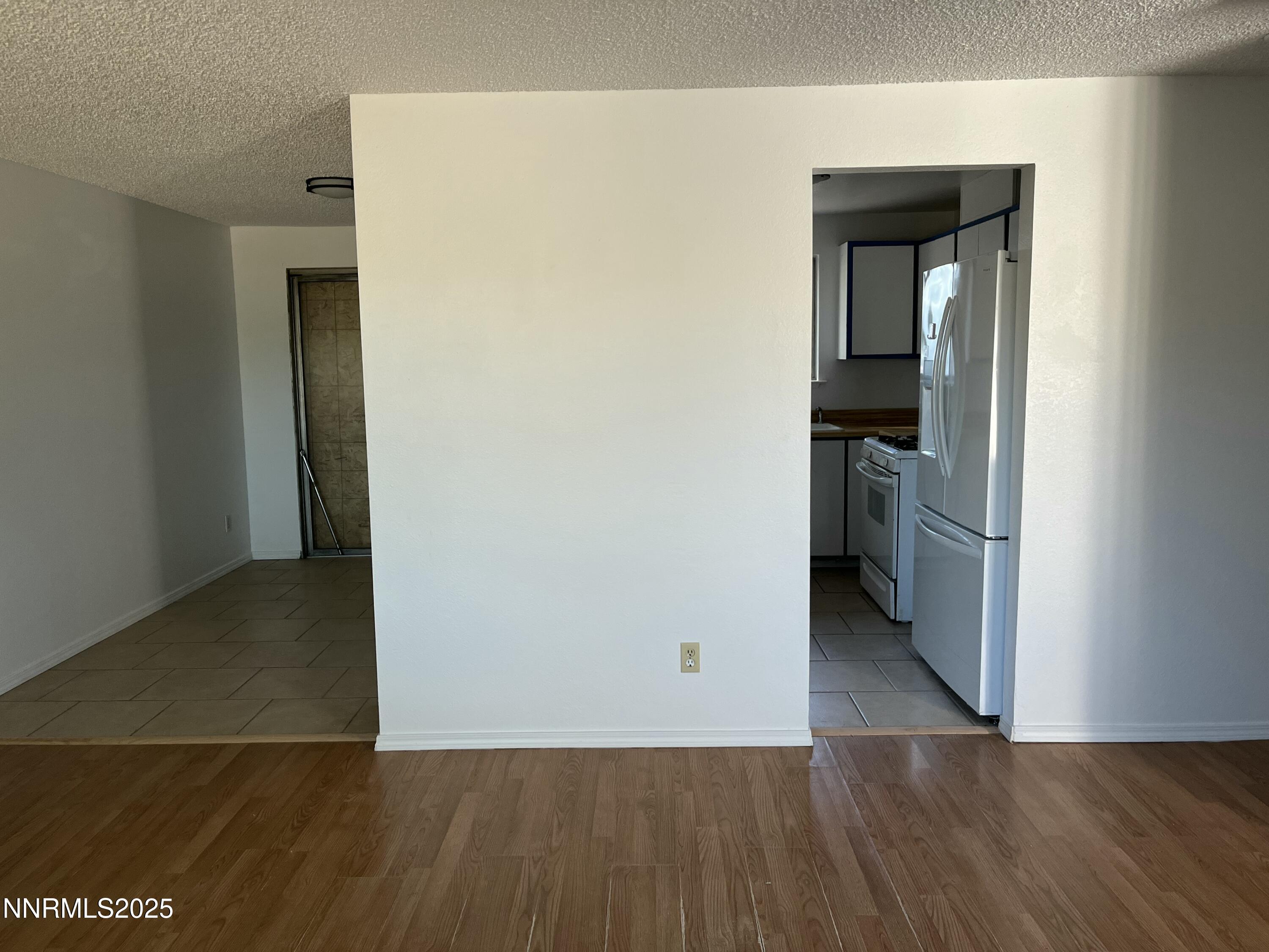 11019 Bornite Court Reno, NV 89506 - Photo 20 of 30 a view of a kitchen from a hallway