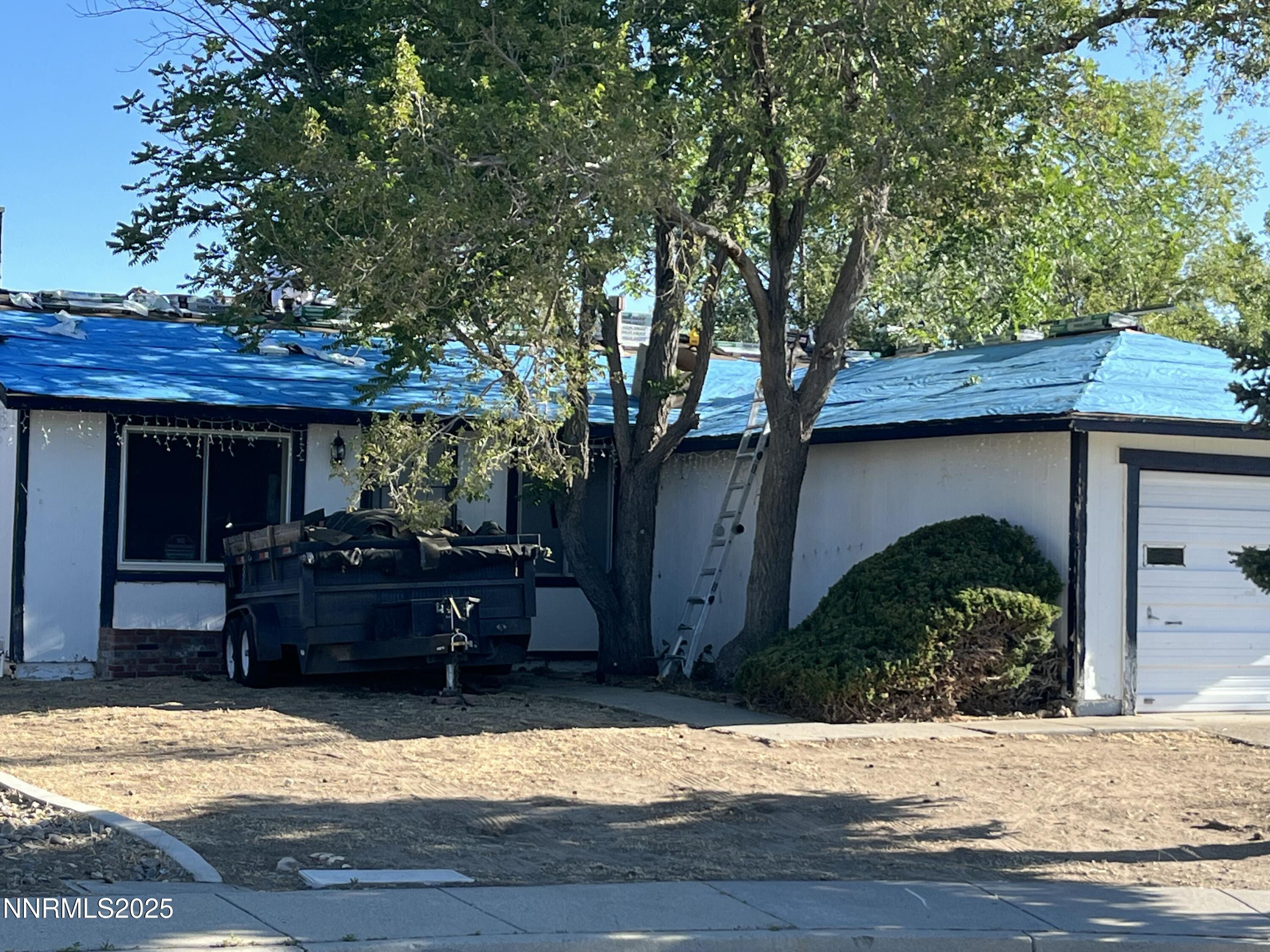 11019 Bornite Court Reno, NV 89506 - Photo 22 of 30 a front view of a house with a yard