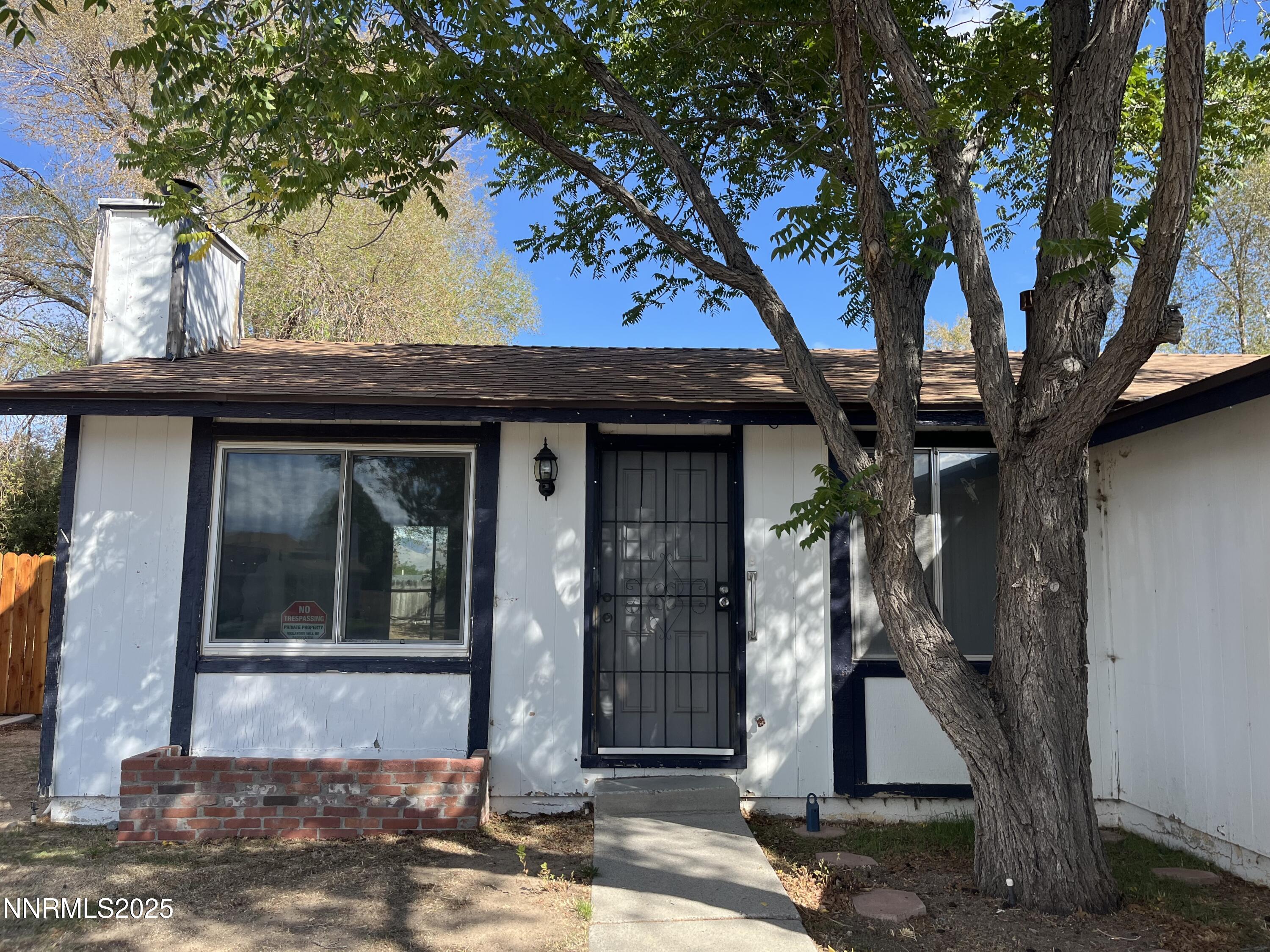 11019 Bornite Court Reno, NV 89506 - Photo 28 of 30 a view of a house with a tree