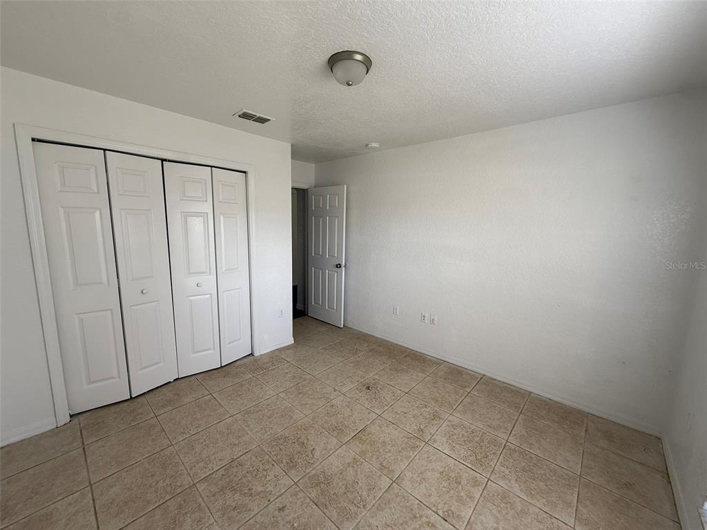 417 Francisco Way Kissimmee, FL 34758 - Photo 14 of 20 a view of an empty room
