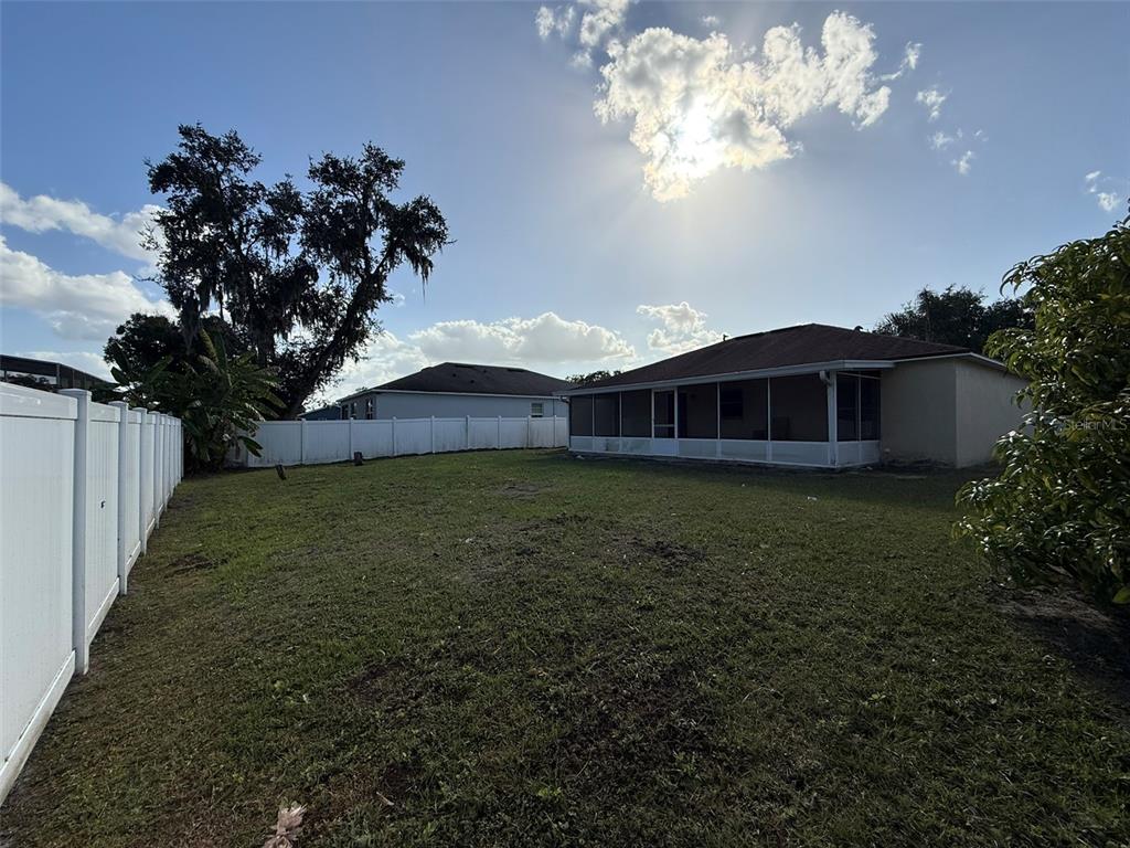 417 Francisco Way Kissimmee, FL 34758 - Photo 4 of 20 a view of a house with a yard