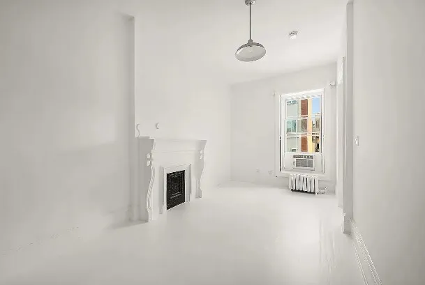 a kitchen with stainless steel appliances granite countertop a sink and a stove