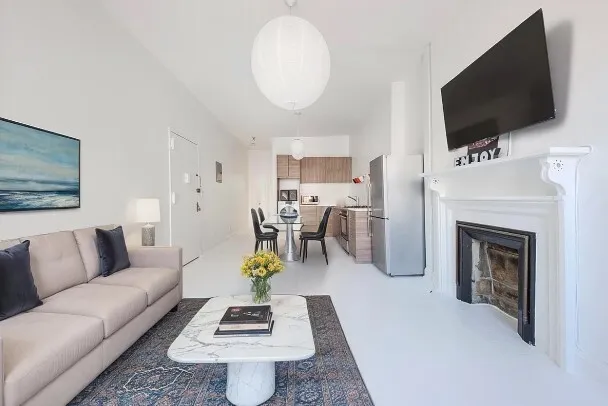 a bathroom with a bathtub and a window