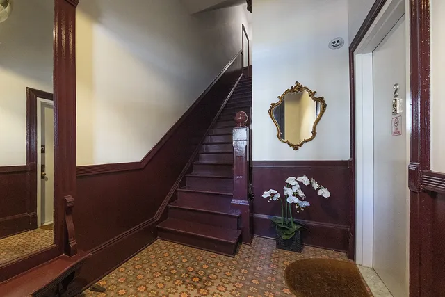 a view of entryway with wooden floor
