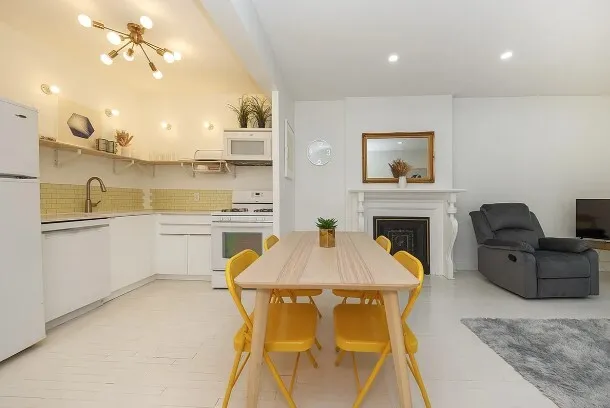 a bathroom with a sink a toilet and a vanity