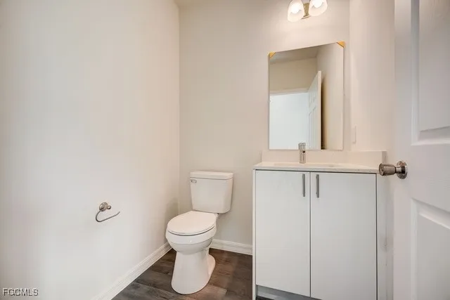 a bathroom with a toilet and a sink
