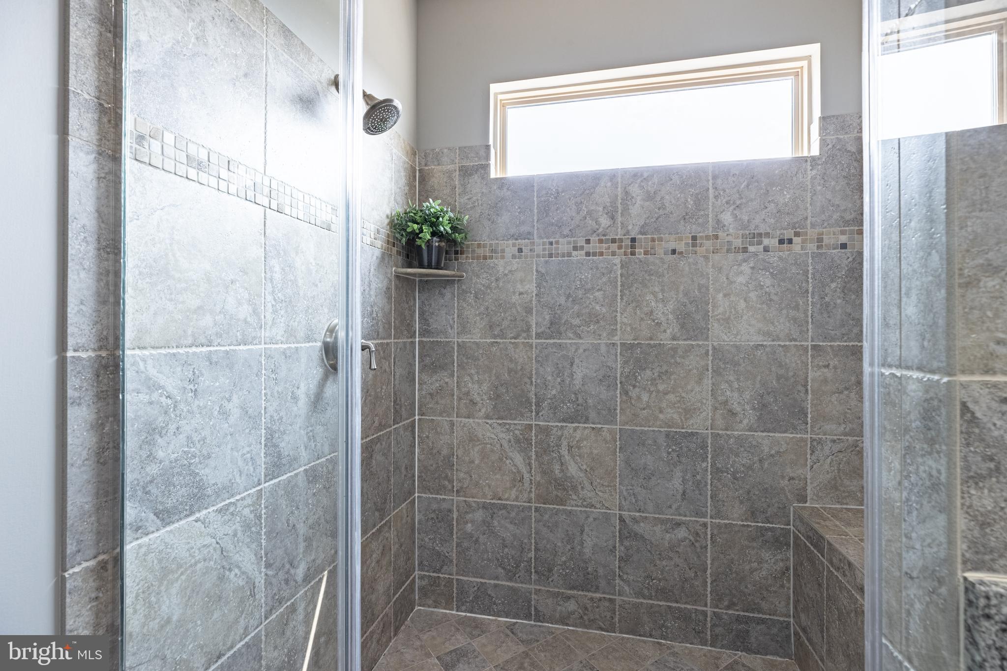 42283 Rhett Drive Brambleton, VA 20148 - Photo 39 of 49 Upgraded tile and shower seat