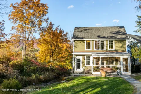 front view of a house with a yard