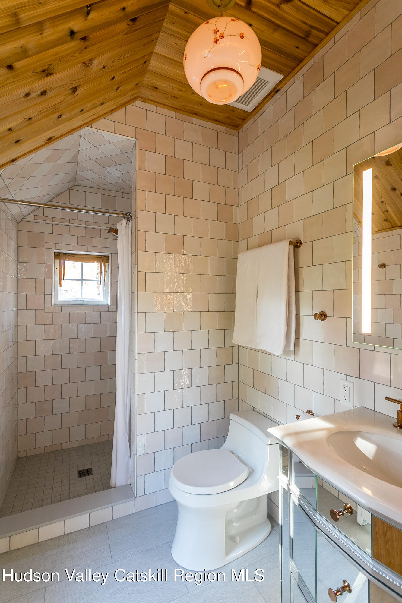 14 Old Forge Road Woodstock, NY 12498 - Photo 17 of 29 a bathroom with a sink a toilet and shower