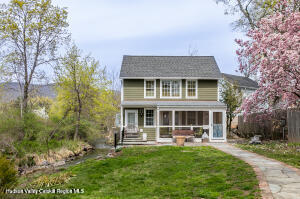14 Old Forge Road Woodstock, NY 12498 - Photo 2 of 29 a front view of a house with a yard
