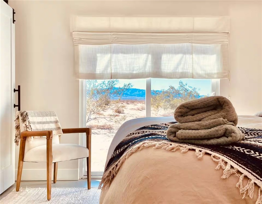 83683 Amboy Road Twentynine Palms, CA 92277 - Photo 13 of 22 a room with furniture and a large window