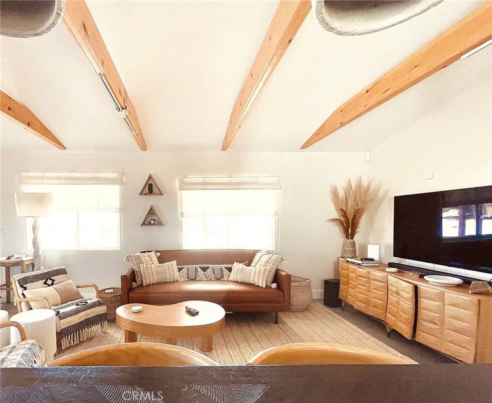 83683 Amboy Road Twentynine Palms, CA 92277 - Photo 4 of 22 a living room with furniture and a flat screen tv