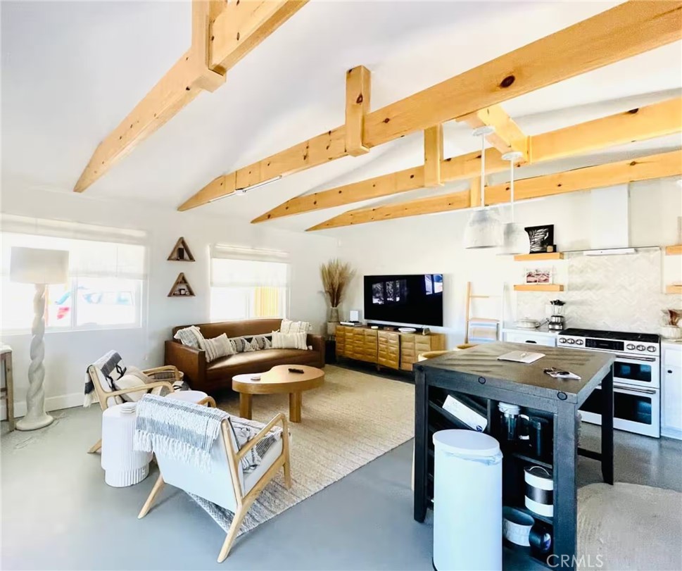 83683 Amboy Road Twentynine Palms, CA 92277 - Photo 7 of 22 a living room with furniture and a flat screen tv